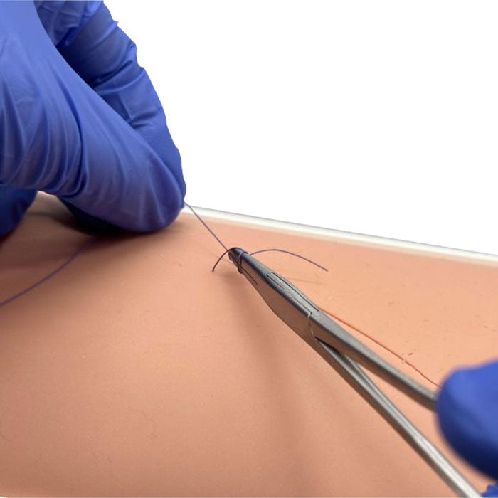 Entraîneur de suture cutanée