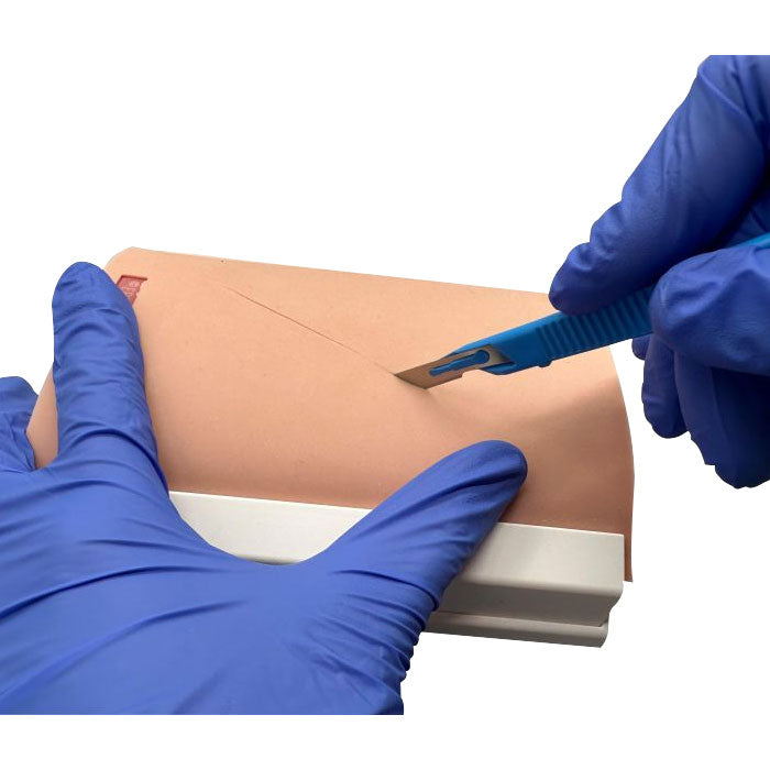 Entraîneur de suture cutanée