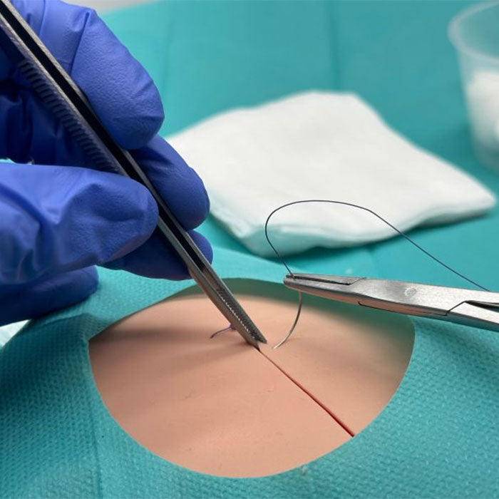 Entraîneur de suture cutanée
