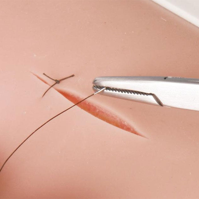 Entraîneur de suture cutanée